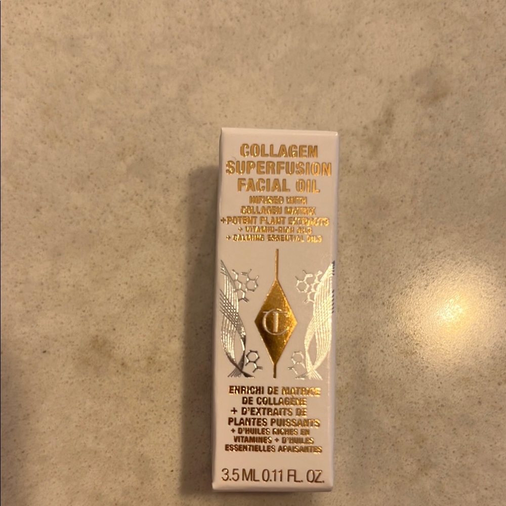 Charlotte Tilbury Collagen Superfusion Facial Oil in White and Gold